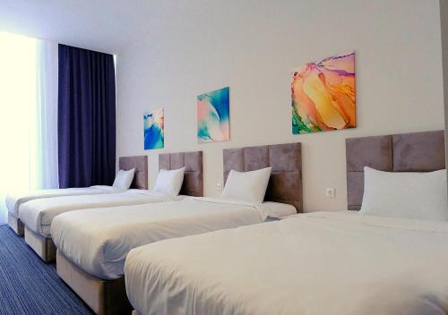 ADD Hotel Almatyにあるベッド