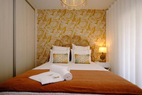 Postel nebo postele na pokoji v ubytování Resort Holidays Nazaré