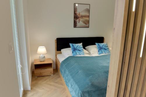 Postel nebo postele na pokoji v ubytování Apartament SunPark