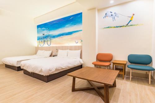 Postel nebo postele na pokoji v ubytování Rhino Guest House