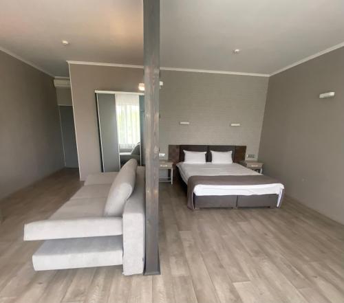 Кровать или кровати в номере Pallada Hotel