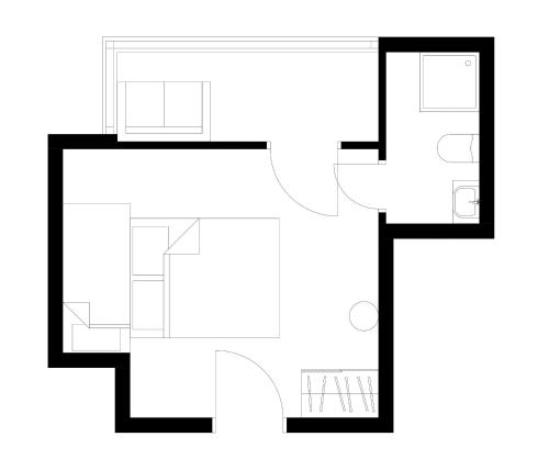 a black and white floor plan of a house at Villa Fantasia Budget Boutique Hotel in Füssen