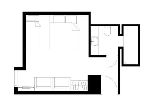 a black and white floor plan of a house at Villa Fantasia Budget Boutique Hotel in Füssen