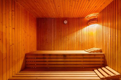 a wooden sauna with a light on top of it at Hotel Pimar & Spa in Blanes