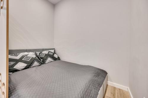 Ένα ή περισσότερα κρεβάτια σε δωμάτιο στο Central Platinum Apartments 26