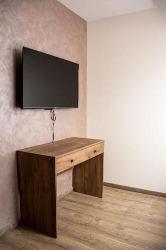 TV a/nebo společenská místnost v ubytování ELEVENROOMS