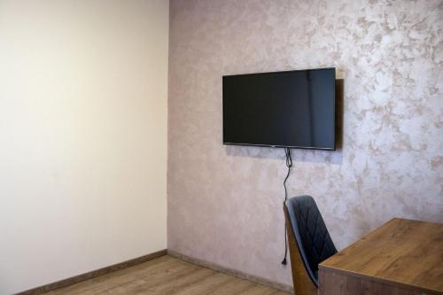 TV a/nebo společenská místnost v ubytování ELEVENROOMS