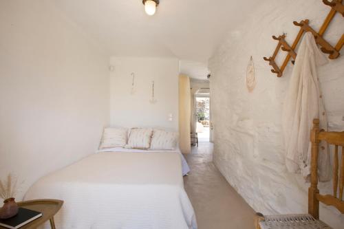 Ένα ή περισσότερα κρεβάτια σε δωμάτιο στο Kea Retreat
