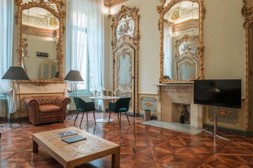 TV a/nebo společenská místnost v ubytování Royal Palace Hotel