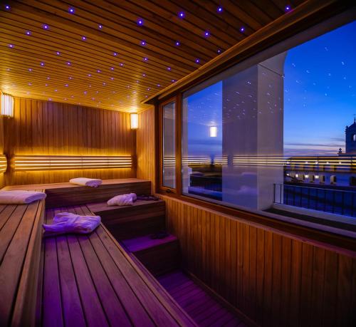 Ένα ή περισσότερα κρεβάτια σε δωμάτιο στο La Recova Hotel & Spa
