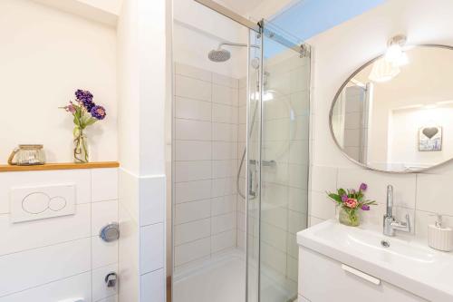 a bathroom with a shower and a sink at Captains Haven in Eckernförde