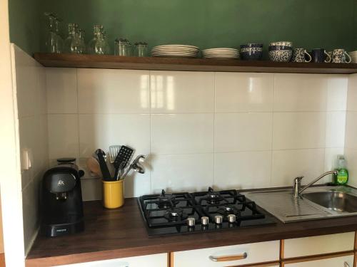 Een keuken of kitchenette bij Jasmin 1 Jeanne d Albret