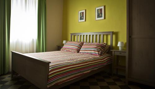 Un pat sau paturi într-o cameră la Liccu Bed and Breakfast