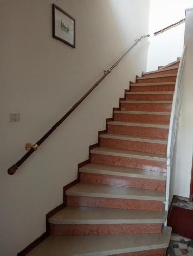 a set of stairs in a house at Dimora LUCILLA in Ponti Sul Mincio