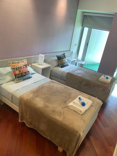 Posteľ alebo postele v izbe v ubytovaní apartment luxe MMR