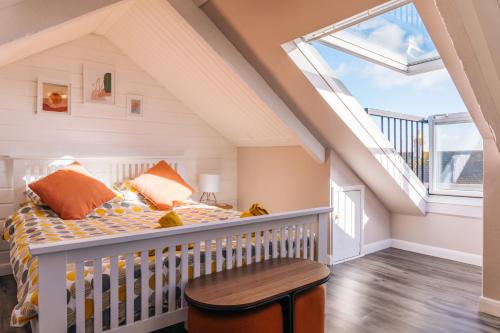 Ένα ή περισσότερα κρεβάτια σε δωμάτιο στο The Mexico Inn, Flat Two