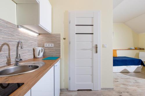 Postel nebo postele na pokoji v ubytování Apartament MORSKI 407 Dziwnówek nad morzem EPapartamenty