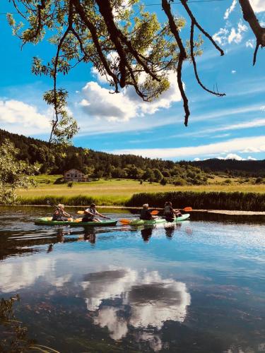 a group of people in kayaks on a river at Holiday house "Mimoza" 2 massage pools in Otočac