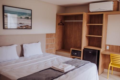 Llit o llits en una habitació de MANANCIAL HOTEL E EVENTOS