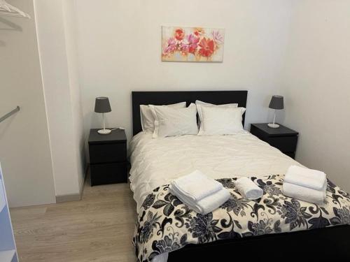 Postel nebo postele na pokoji v ubytování Adega guest house