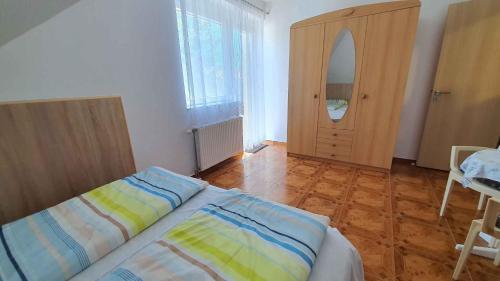 Postel nebo postele na pokoji v ubytování Apartment Zamardi 9