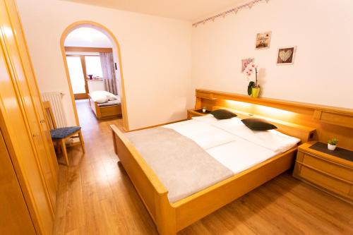 Postel nebo postele na pokoji v ubytování Almhotel Bergerhof