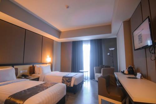 Gallery image of BeSS Mansion Hotel Surabaya in Wonocolo