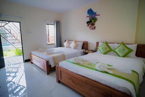 Кровать или кровати в номере 86 Homestay Phan Thiết