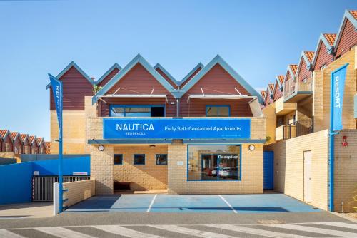 a building with a sign that reads mulka fil art cultural resources at Nautica Residences Hillarys in Perth