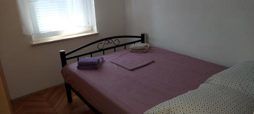 Postel nebo postele na pokoji v ubytování Apartman Murter Jadranko