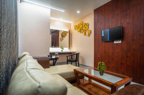 Una televisión o centro de entretenimiento en Mansha Palace