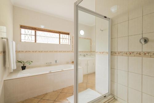 Ένα μπάνιο στο Kouwdouw Guest Farm