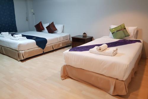Postel nebo postele na pokoji v ubytování Pai Sukhothai Resort SHA Extra Plus
