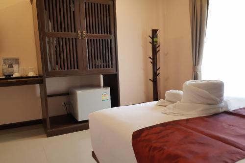 Postel nebo postele na pokoji v ubytování Pai Sukhothai Resort SHA Extra Plus