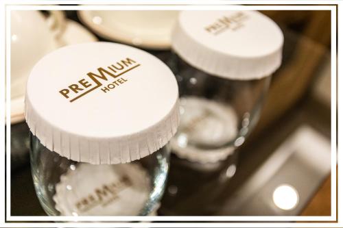a close up of two empty wine glasses at Premium Hotel Ganja in Ganja