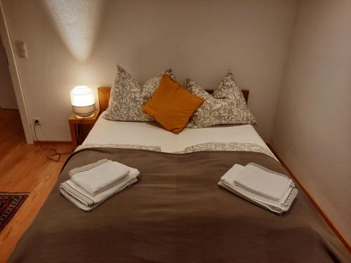 Postel nebo postele na pokoji v ubytování Appartment Römerstrasse