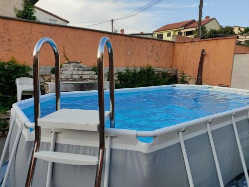 Πισίνα στο ή κοντά στο Apartment Tessa met Dakterras en Zeezicht Airco Wifi en Zwembad