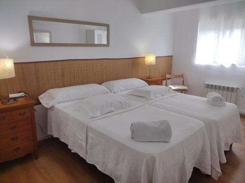 Llit o llits en una habitació de Piso a 20 minutos del centro Madrid con wifi