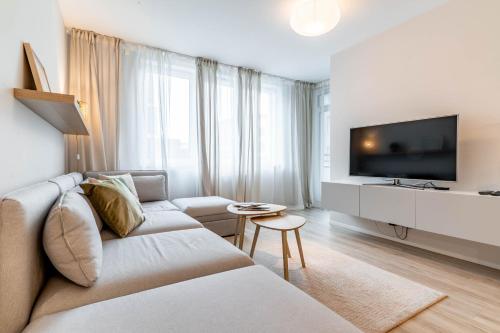TV a/nebo společenská místnost v ubytování WrocApartments StarCenter - Parking Free