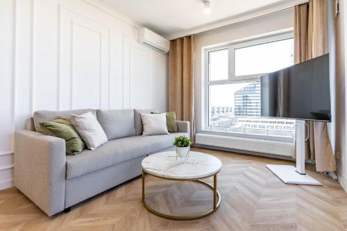 TV a/nebo společenská místnost v ubytování WrocApartments StarCenter - Parking Free