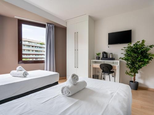 เตียงในห้องที่ limehome Barcelona Carrer de Fontcoberta - Digital Access