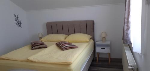 Voodi või voodid majutusasutuse Guesthouse Sara toas