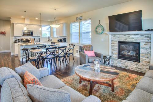 a living room with a couch and a fireplace at Crabby Daddy The Blue Mermaid in Ocean Shores