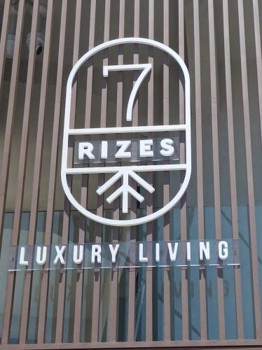 a sign on the side of a building at 7Rizes Luxury Living in Heraklio Town