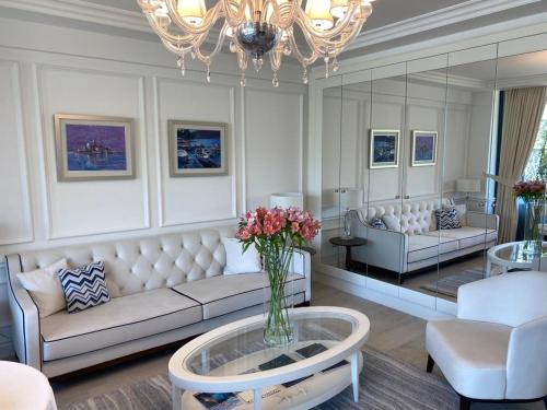 a living room with a couch and a table at Boutique Hotel Vissi d'Arte in Budva