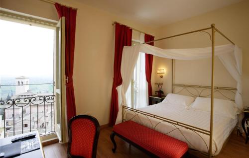Postel nebo postele na pokoji v ubytování Giotto Hotel & Spa