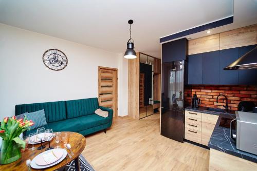 Gallery image of Apartament ,, COŚ NIECOŚ ,, Suwałki LOFT " Wypożycz Rent a PlayStation 5 " KLIMATYZACJA,GARAŻ, ŁADOWANIE AUT ELEKTRYCZNYCH, MONITOROWANE ZAMKNIĘTE OSIEDLE in Suwałki