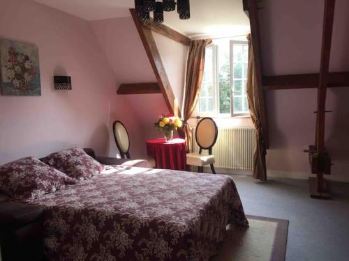 Ένα ή περισσότερα κρεβάτια σε δωμάτιο στο Villa Bonaparte
