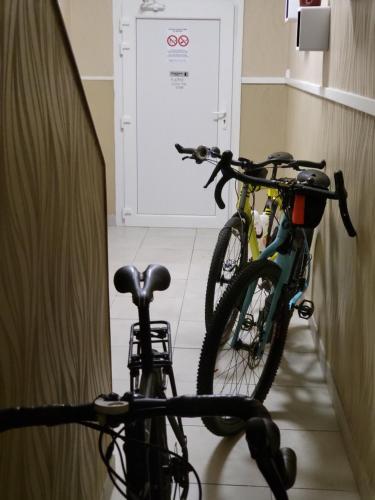 two bikes parked next to each other in a room at Chambres privées Calais Ferry-Port-Place d'armes in Calais