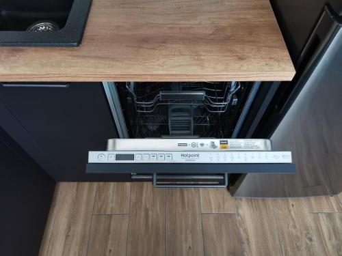 Köök või kööginurk majutusasutuses Przytulny apartament w wieżowcu - Centrum miasta Podwisłocze 38